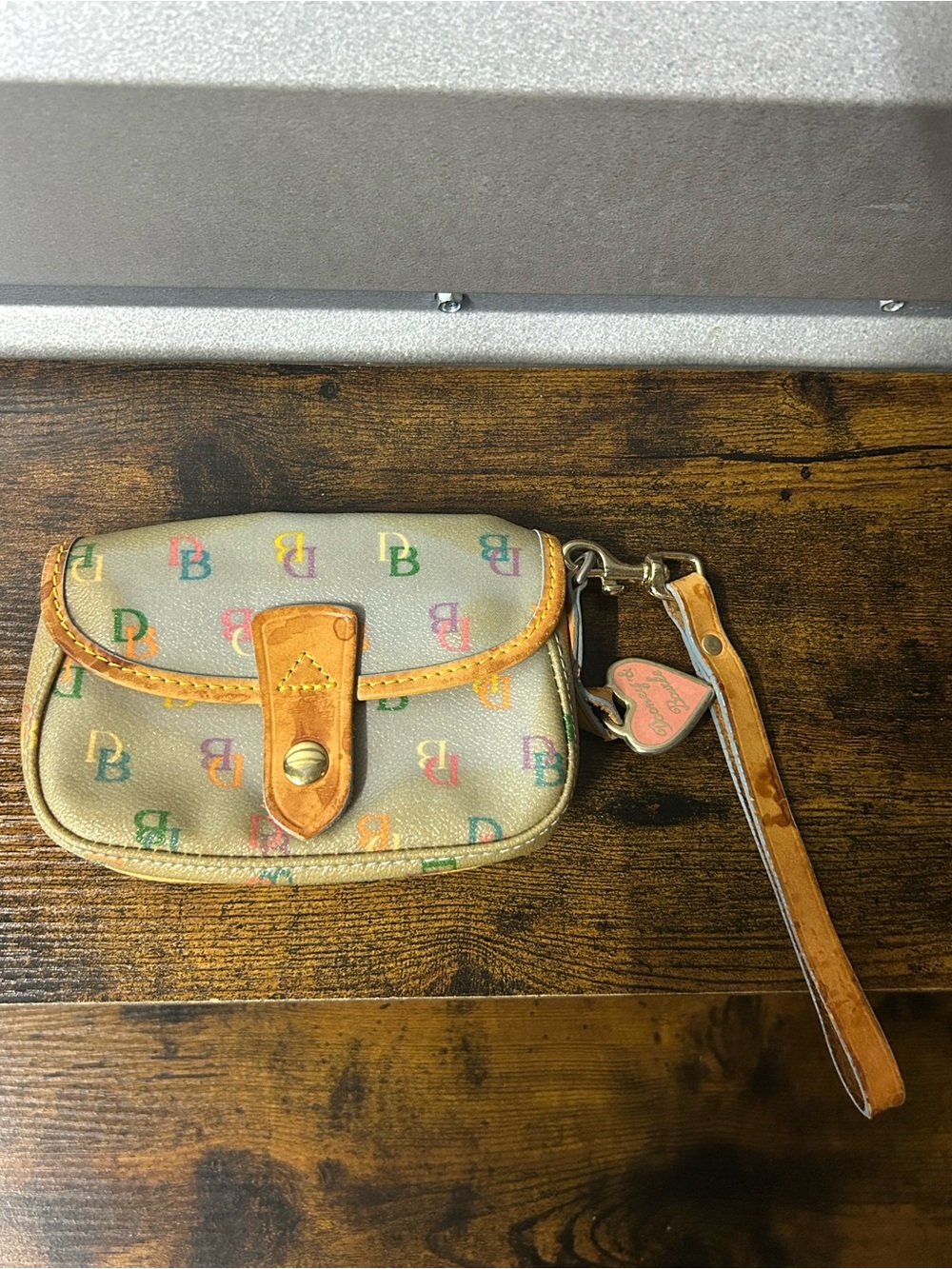 Dooney & Bourke Rainbow Monogram Blue Coated Canvas Wristlet Pouch